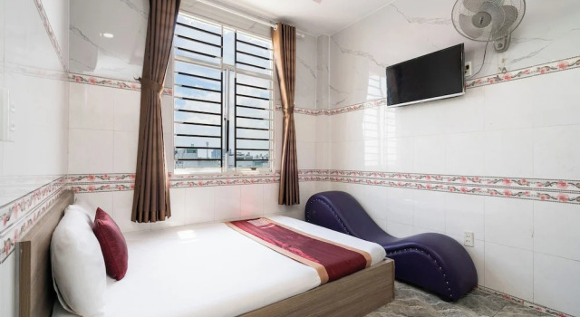 Номер Deluxe Collection O District 12 - Mau Tim Hotel