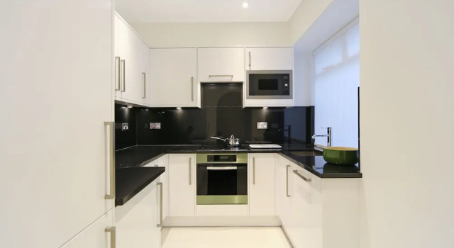 Апартаменты Цокольный этаж c 1 комнатой Queensgate Court Apartments