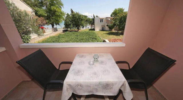 Студия Apartments Floras