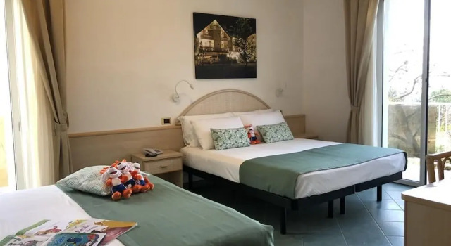 Номер Deluxe Pinetina Mare Baby Family Hotel