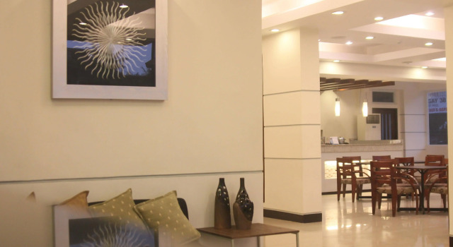 Negrense Suites, Забронировать Отель Баколод Negros Occidental, рядом с Negros Museum