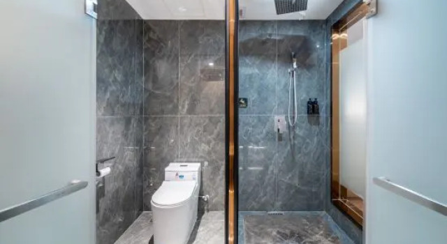 Кровать в общем номере Bole Riverside Peninsula Hotel
