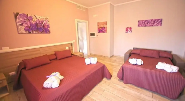 Четырёхместный номер Standard ORCHIDEA HOUSE FIUMICINO two