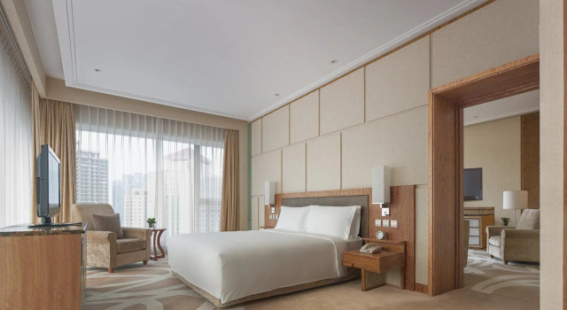 Люкс c 1 комнатой New World Dalian Hotel