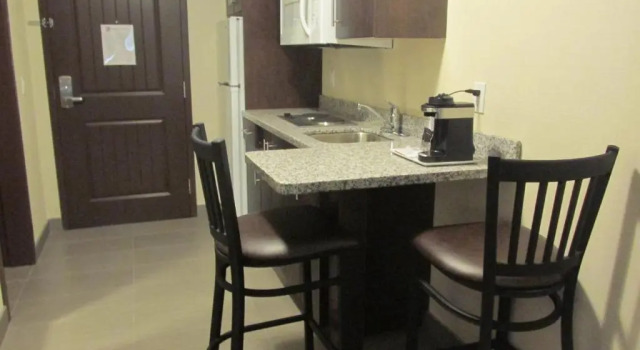 Четырёхместный номер Standard Sigma Inn & Suites
