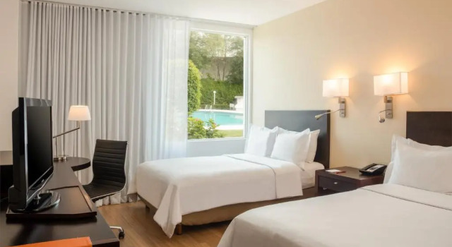 Четырёхместный номер Standard Fiesta Inn Express Perinorte