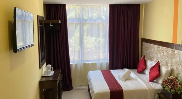 Номер Deluxe SUN INNS PERMAS JAYA