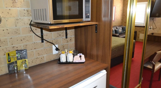 Номер Deluxe Tamworth Motor Inn & Cabins