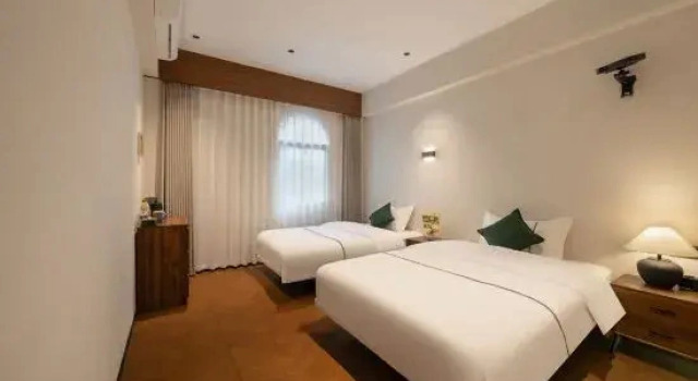 Двухместный семейный люкс Litang Homestay (West Street Branch)