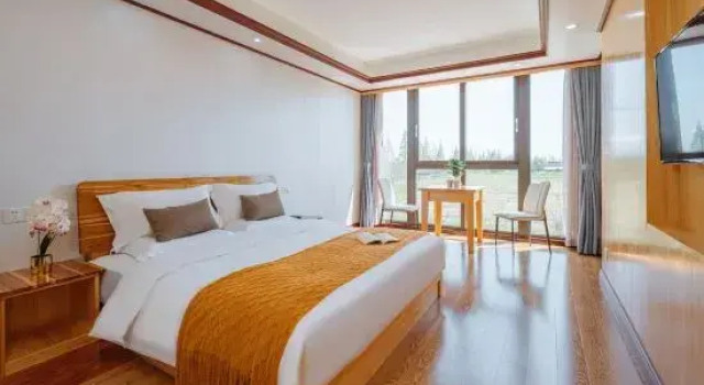 Кровать в общем номере Floral Hotel · Shanghaidaoju Hotel (Chongming Nanmen Pier Branch)