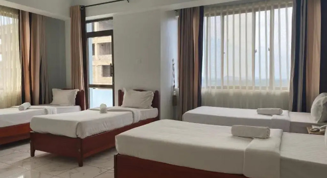 Кровать в общем номере Panama Inn