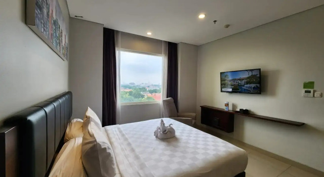 Camera Deluxe PrimeBiz Hotel Surabaya