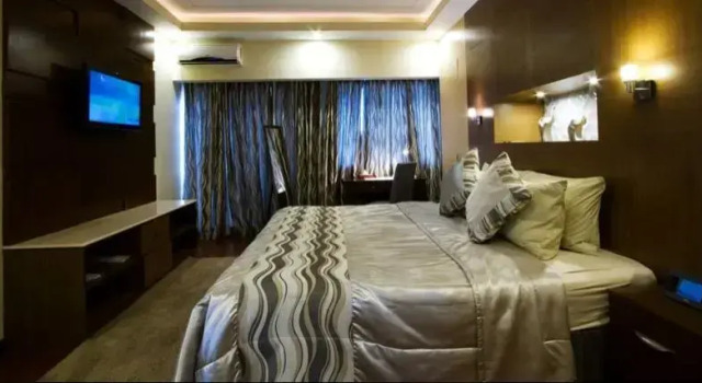 Четырёхместный семейный номер Standard The Pinnacle Hotel and Suites