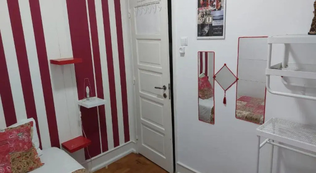 Кровать в общем номере Ameli Rooms