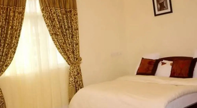 Mangel Hotel and Suites, Забронировать Отель Калабар Нигерия