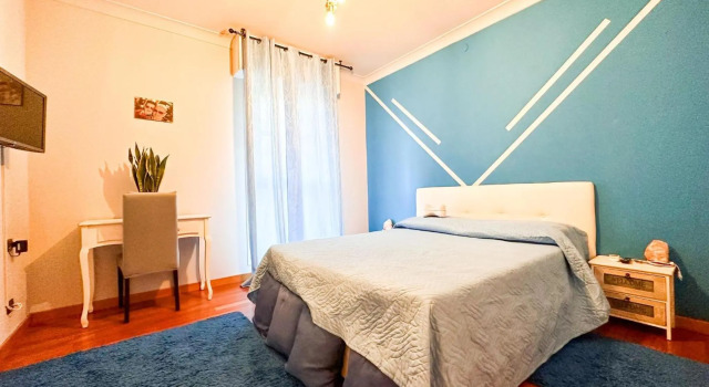 Room in Guest Room - Camera Rosa Appartamento Quadrifoglio