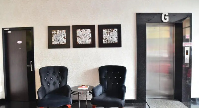 Кровать в общем номере DMetro Hotel