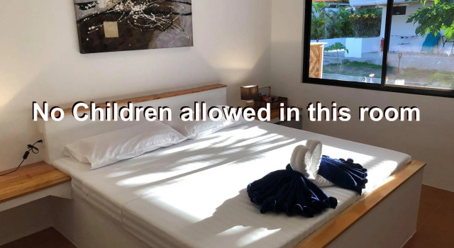 O podwyższonym standardzie pokój Parrot Resort Moalboal