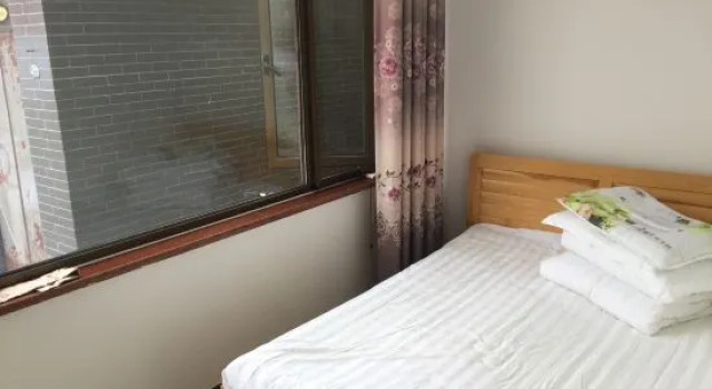 Кровать в общем номере Beijing Kaixuange B & B
