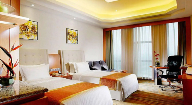 Dezhou Regal Kangbo Hotel, Book Hotel Hoteller i Dezhou med parkering, Parkering