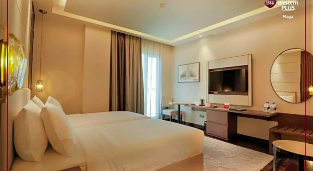 Executivo quarto Best Western Plus Runway - Luxury Collection Hotel