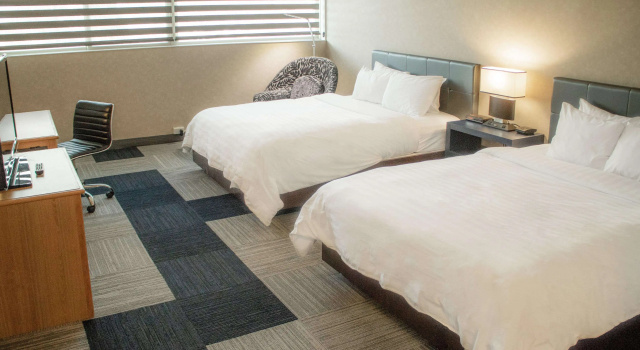 Четырёхместный номер Standard The Rushmore Hotel & Suites; BW Premier Collection