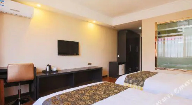 Dunhua Service Building Hotel, Rezervovat Hotel Dunhua Jilin
