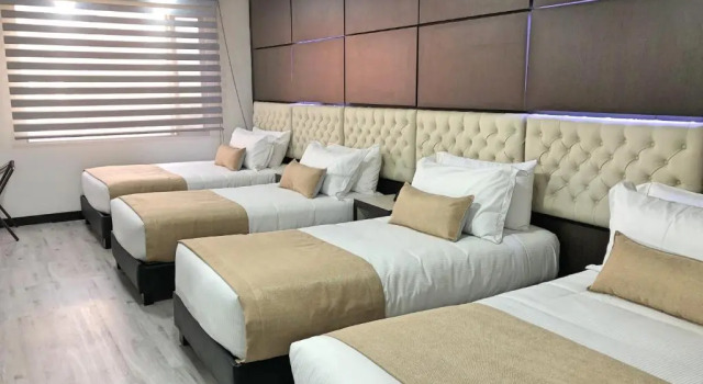 Четырёхместный номер Superior Hotel American Visa Tower