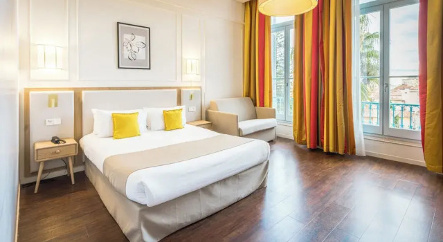 Четырёхместный номер Standard Hôtel Miléade LOrangeraie - entièrement rénové
