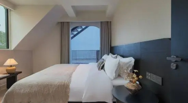 Семейный люкс с 2 комнатами с балконом и с видом на море Xi'an Scenic Apartment (MOMOO Momo Sea)