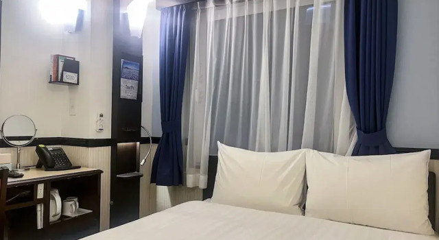 Номер Economy Toyoko Inn Tokyo eki Yaesu Kita guchi