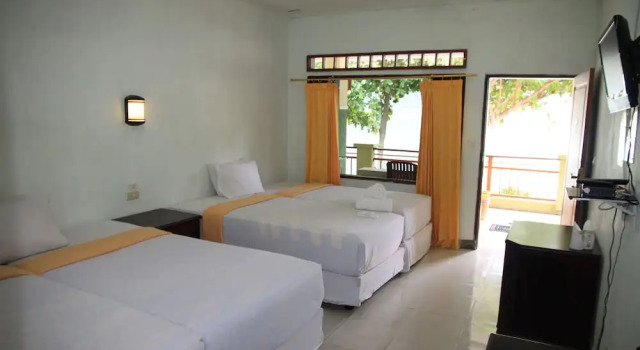 Четырёхместный номер Deluxe с видом на озеро Pandu Lakeside Hotel Parapat - Toba Lake
