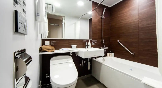 Кровать в общем номере (женский номер) Daiwa Roynet Hotel Kokura Ekimae
