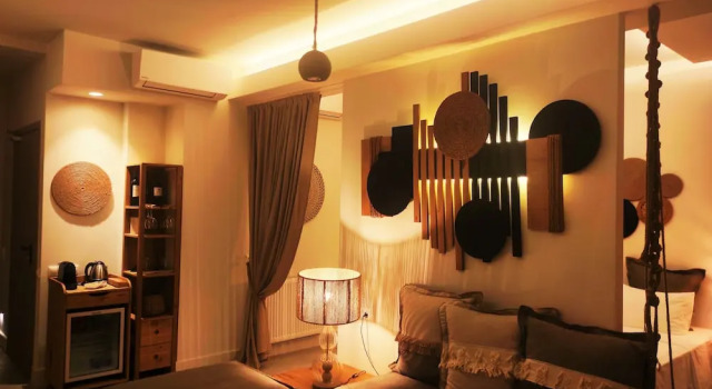 Люкс Цокольный этаж с балконом и с видом на море Karystion Hotel