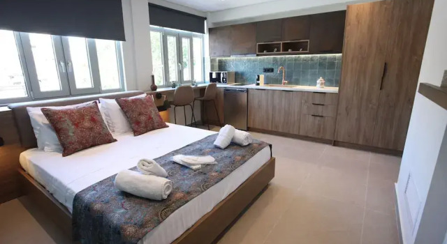 IPELHOME-Avissinias Boutique Apartments, Забронировать Апартаменты/квартира Афины Острова Саронического залива - Аттика, рядом с Холм Филопаппос