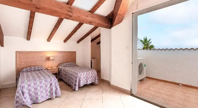 Кровать в общем номере Residence Vacanceole Sognu di Rena