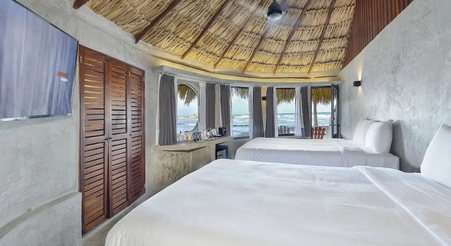 Camera quadrupla Standard vista oceano Maya Tulum By G Hotels