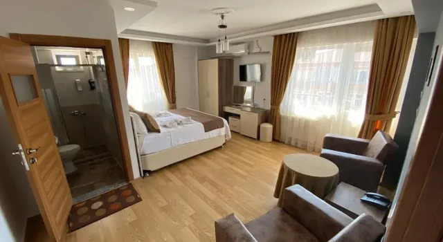 Двухместный номер Deluxe c 1 комнатой с балконом и с видом на город Figen Hotel