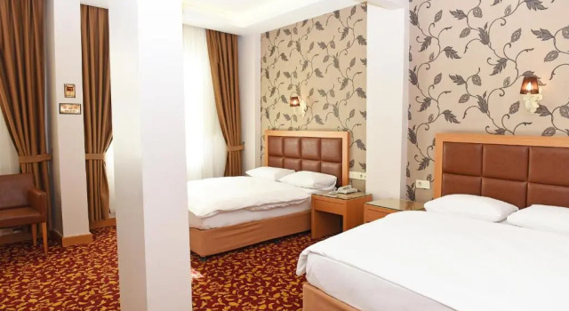 Четырёхместный номер Deluxe Hotel Grand Umit