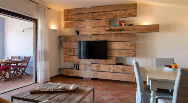 It is located on the ground floor and consists of a large room with a double bed, a bathroom with a-MOLARA 1_PT, Book Hotel Golfo Aranci Emerald Coast