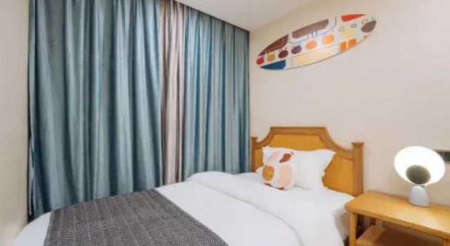 Люкс Luxury с 2 комнатами с балконом и с видом на море Wanning · Qihai Surfing Scenic Apartment (Sunac Riyue Bay)