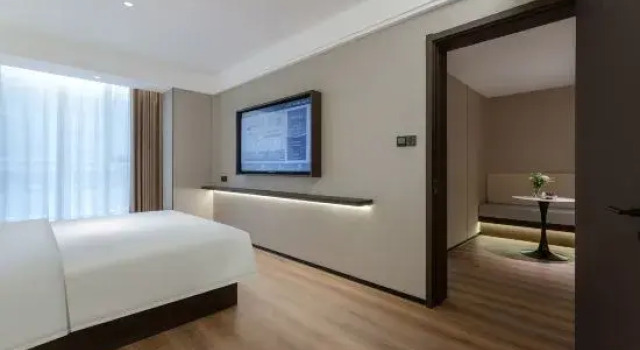 Семейный люкс с 2 комнатами Wanxin International Hotel (Datong Wanda Plaza Branc