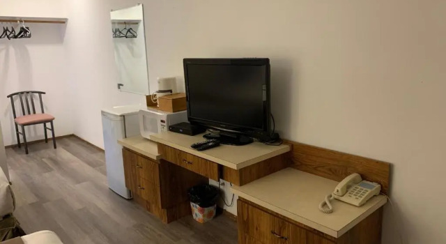 Четырёхместная студия Swiss Sunset Inn
