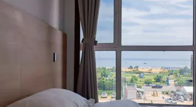 Люкс с 3 комнатами с видом на океан Deep Blue 1996 Seaview Apartment (Qingdao Golden Beach Branch)