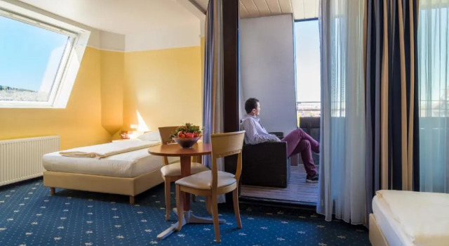 Четырёхместный номер Standard Aparthotel Astro - Nichtraucherhotel