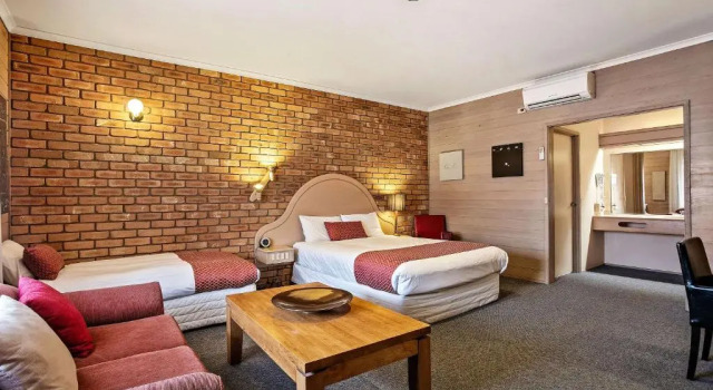 Deluxe triple chambre Quality Inn Colonial