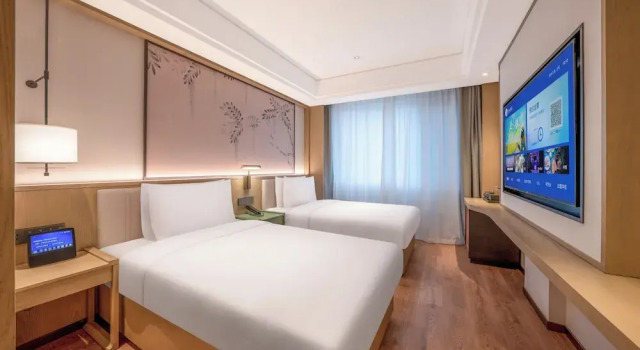 Номер Economy Manxin Hotel