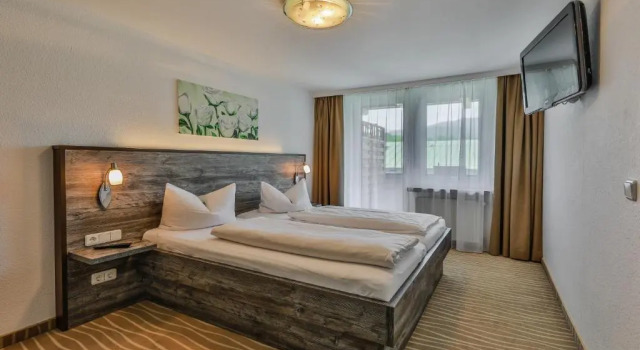 Номер Deluxe Alpenhotel Fischer 4 Sterne