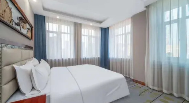 Люкс Deluxe Wu Hua Tian Yue Hotel (Zhongwei Gulou South Street Branch)