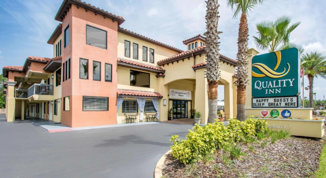 Кровать в общем номере Quality Inn Daytona Speedway - I-95